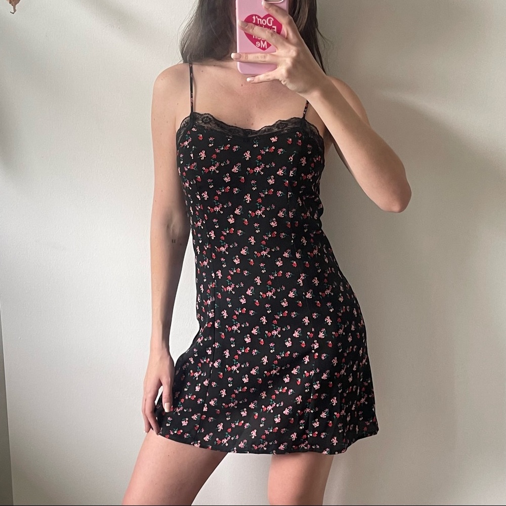 Lace trimmed black mini dress with tiny floral print